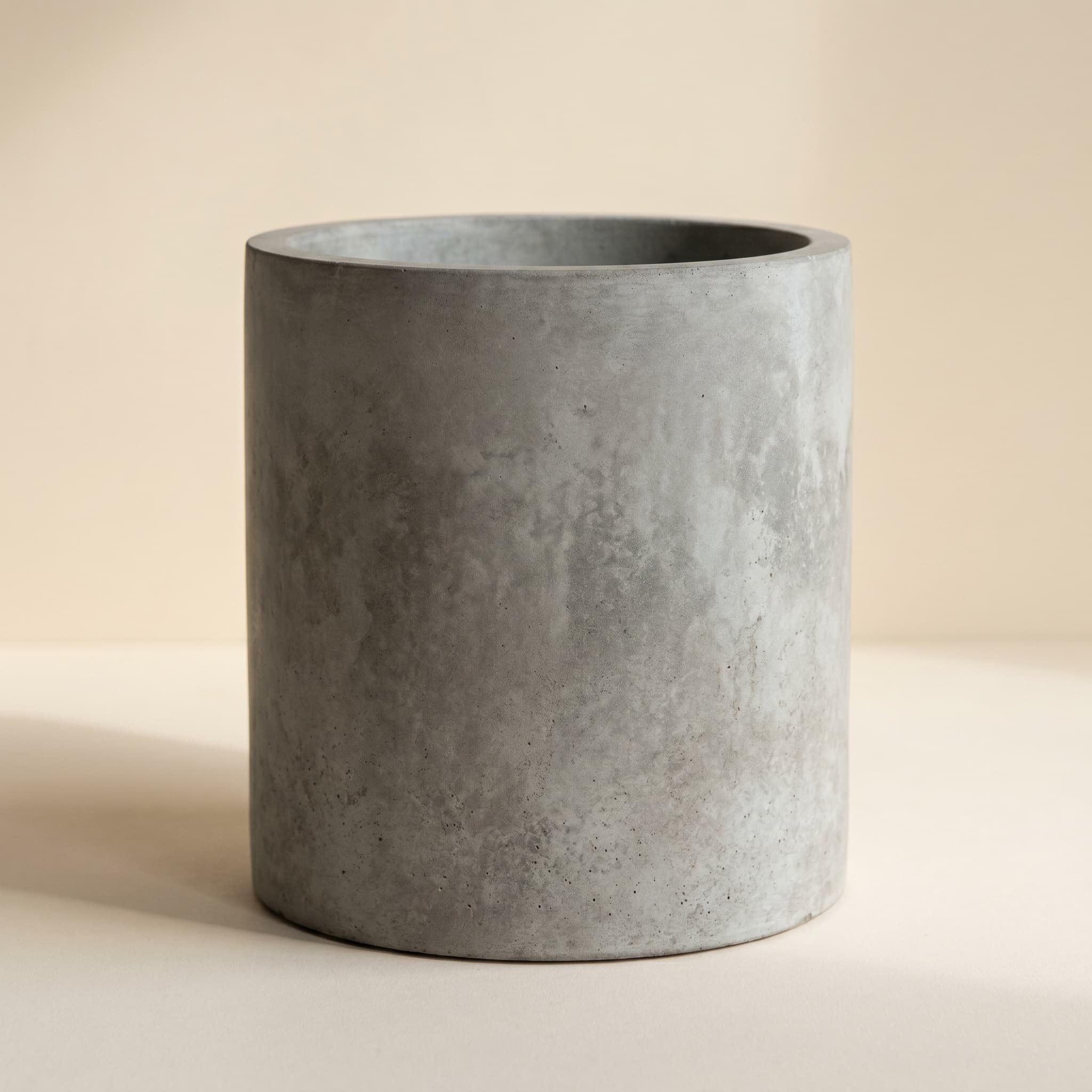 Tall grey concrete cylinder vessel